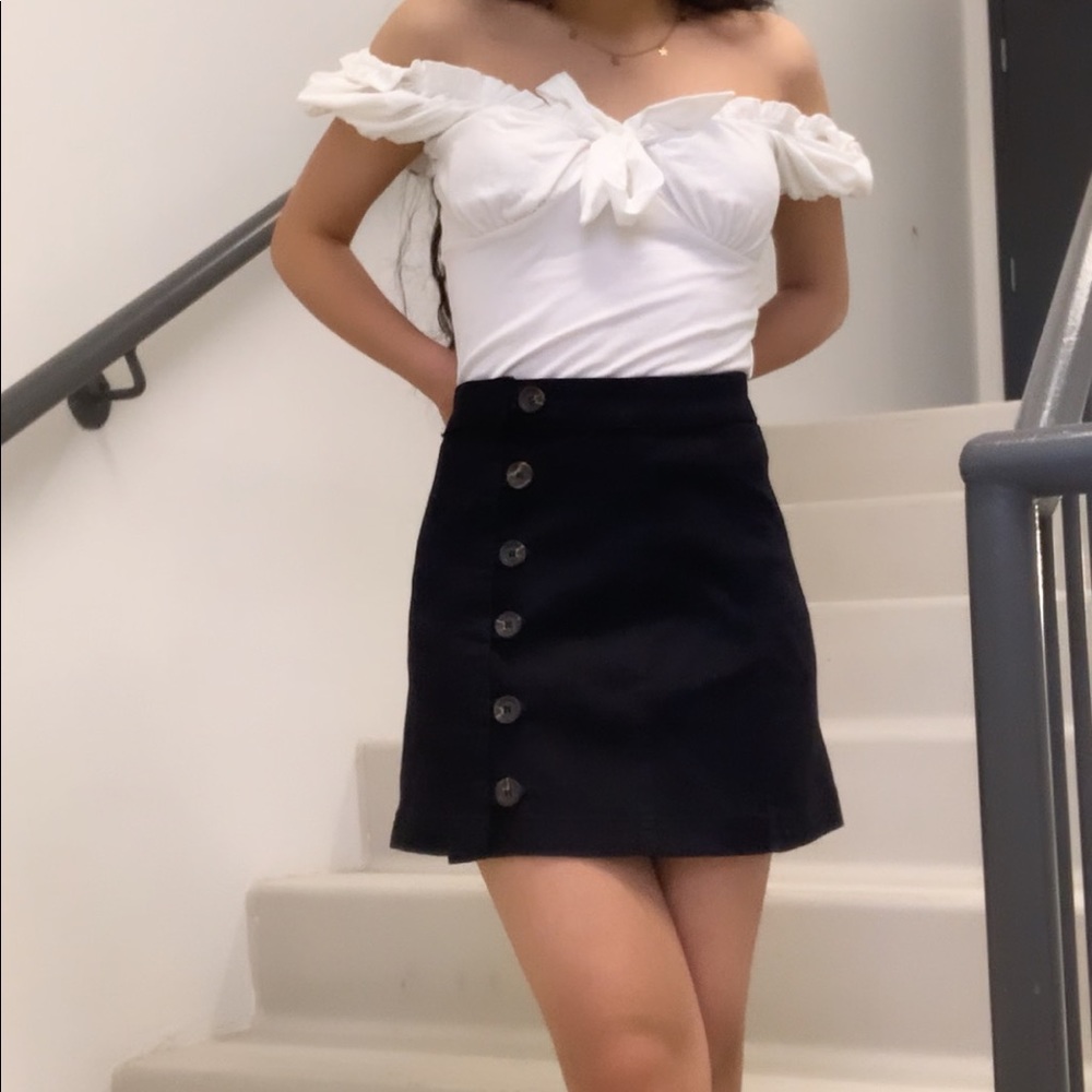 Black jean mini skirt with buttons